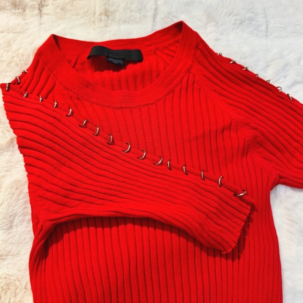 Alexander Wang red rib-knit top with metal ring embellishments along the sleeves